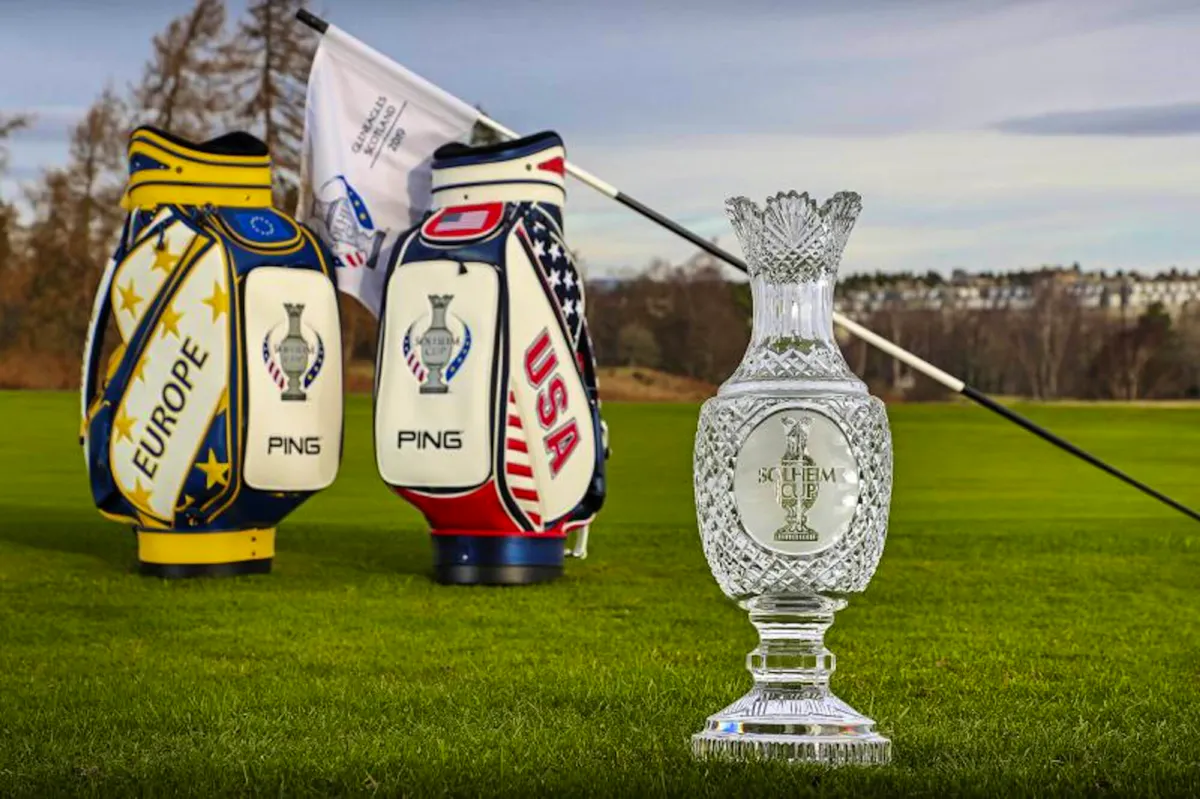 The bags for Team Europe & USA, a flag and the Solheim Cup trophy stand together ahead of the 2019 edition.