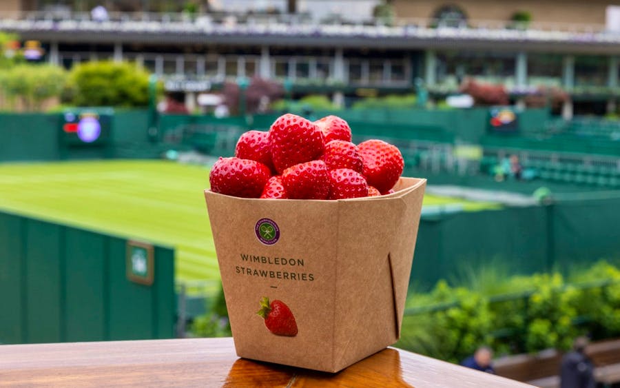 Wimbledon's iconic snack food, a basket of strawberries, typically accompanied by some cream.