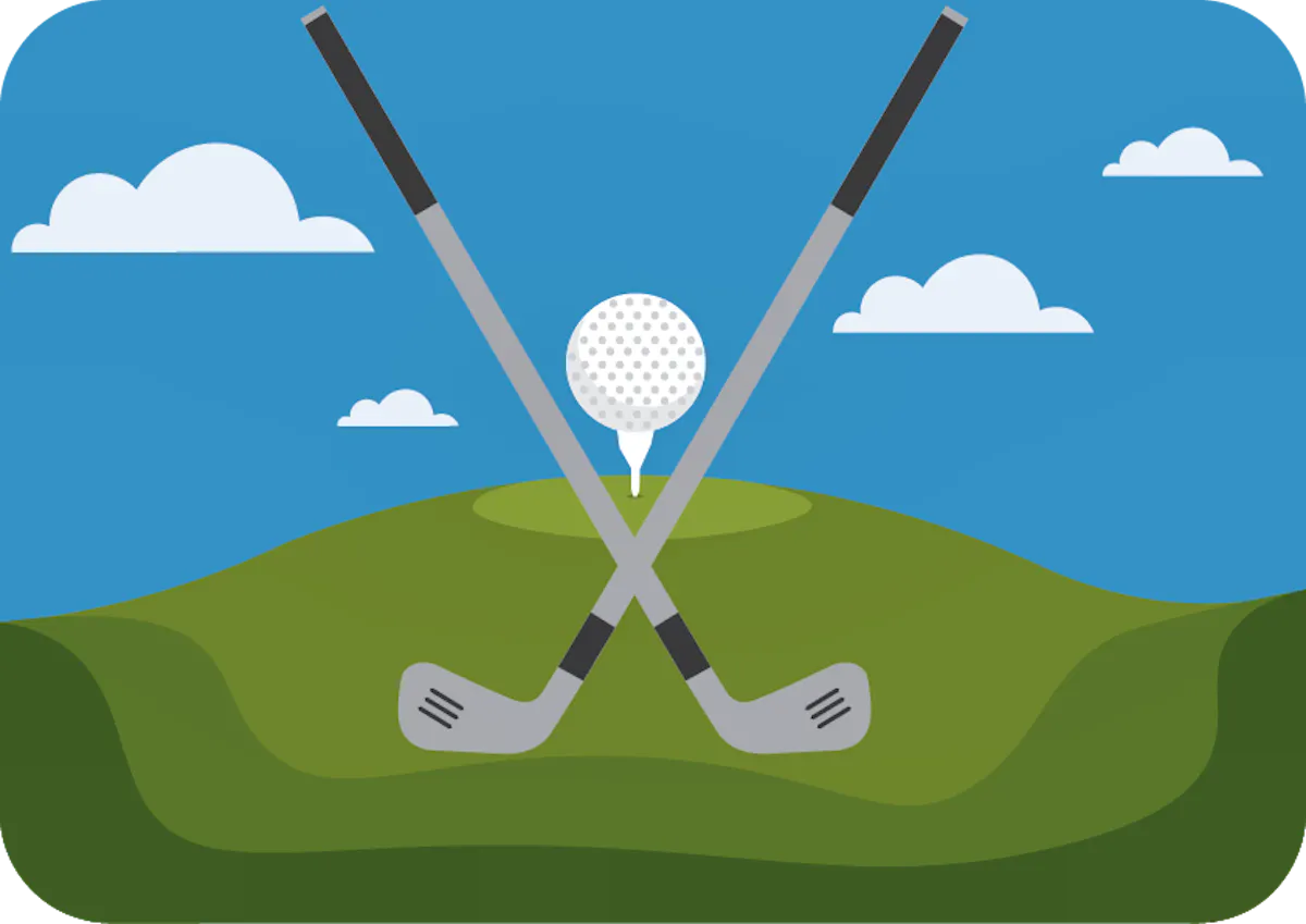 Two golf clubs and a golf ball on a fairway.