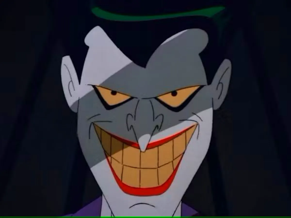 A cartoon version of the Joker, with a wide sinister grin