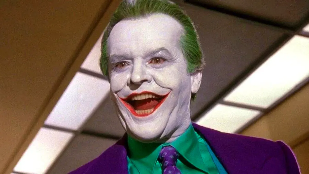 Jack Nicholson, in Joker makeup, grinning maniacally