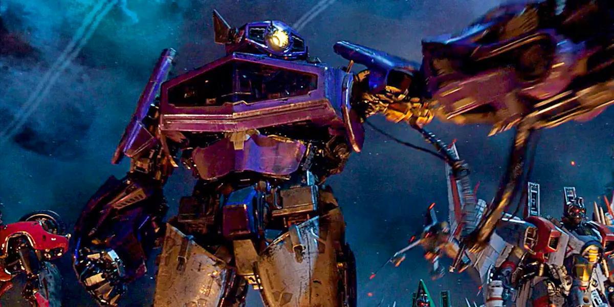 Shockwave, an evil Decepticon, gestures to his fellow bots